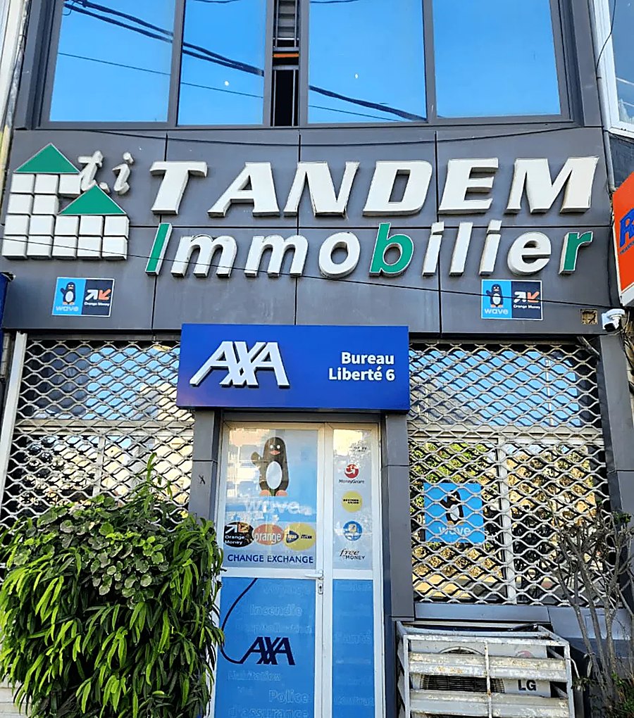 Façade de l'agence Tandem Immobilier, Liberté 6 Extension